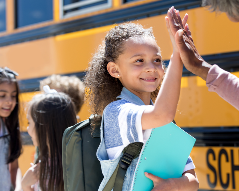 staff and student high five